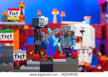 Kiev, Ukraine - December 29, 2019: Minifigure Of Steve With Diamond  Sword Fighting With Wither Skel