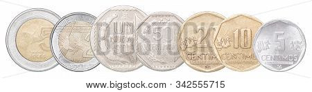 A Full Set Of Coins Of Peru Stand In A Row One After Another. Isolated Over White Background.