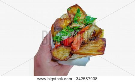 Sabich (israeli Food) In The Hand, Isolated.