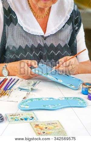 An Elderly Woman Paints Decorative Paintings With Oil. Retirement Hobby. Zoetermeer. Netherlands.