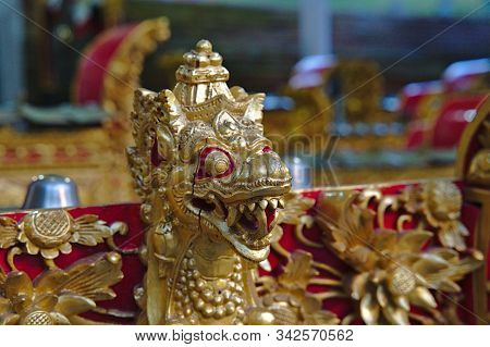 Dragon Figure In A Balinese Temple In Red And Gold Colours