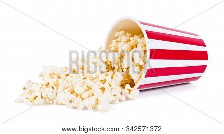 Popcorn Was Scattered From A Large Striped Box, Isolated On White Background.