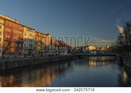 Centre Of Ceske Budejovice City With Old Houses And Towers And Rivers In Sunny Winter Evening