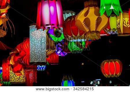 Different Colored Paper Chinese Electric Night Lamp Hanging From The Ceiling On The Occasion Of Chin