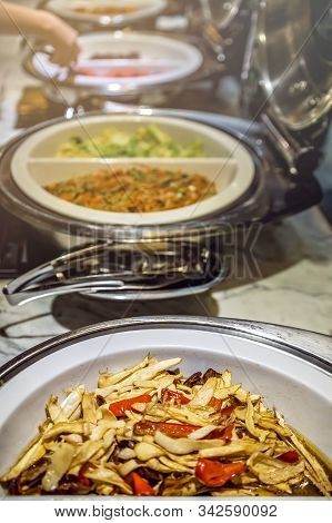 Fried Noodles And Boiled Pakchoy In A Serving Bowl As A Asian Style Breakfast Buffet On The Table In