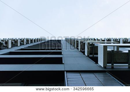 Facade Baskets For Air Conditioners. Multystoried Houses. To Look Up To.