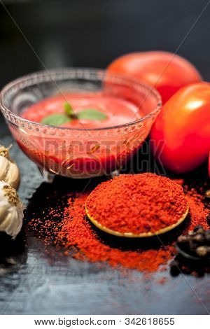 Spicy Tangy Sweet And Sour Fresh Tomato Sauce In A Glass Bowl Along With Some Raw Fresh Tomatoes, Gr