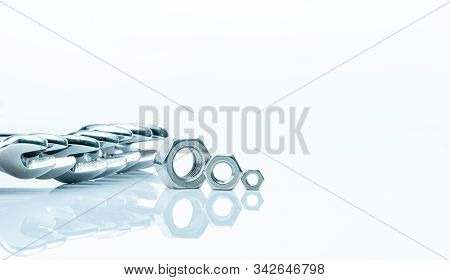 Metal Hexagon Nuts And Chrome Wrenches Isolated On White Background. Mechanic Tools For Maintenance.