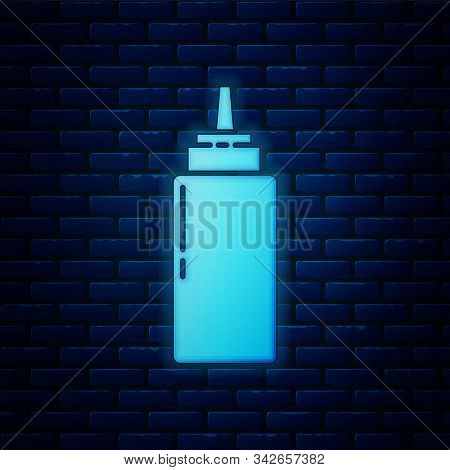 Glowing Neon Sauce Bottle Icon Isolated On Brick Wall Background. Ketchup, Mustard And Mayonnaise Bo