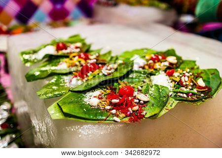 Collection Of Betel Leaf Banarasi Paan And Fire Paan Displayed For Sale At A Shop With Selective Foc