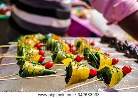 Cone Of Mango Flavored Betel Leaf Stuffed With Cherry Known As Mango Paan With Selective Focus And B