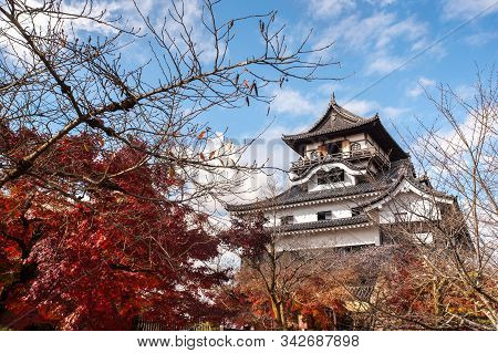 Red Leaves At Inuyama Castle, Aichi Prefecture, Japan. Inuyama Is One Of Only Twelve Original Castle
