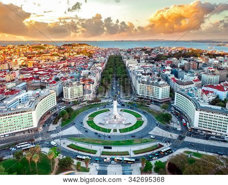 Lisbon Aerial Skyline Panorama European City View On Marques De Pombal Square Monument, Sunset Outsi