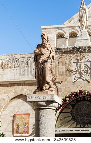 Jerusalem, Israel, December 28, 2018 : Statue Of St. Hieronymus Stands In The Courtyard Of The Chape