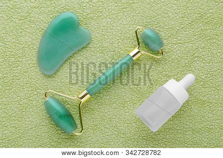 Jade Facial Roller, Massage Stone And Face Serum