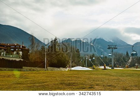 Bansko, Bulgaria - December 27, 2019: Ski Resort Center In Bulgaria. Cableway For Climbing The Mount