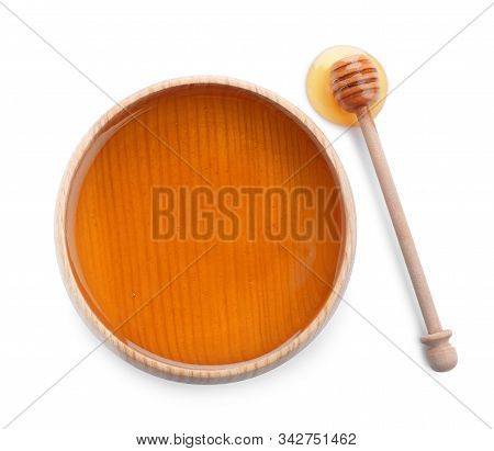 Bowl Of Organic Honey And Dipper Isolated On White, Top View
