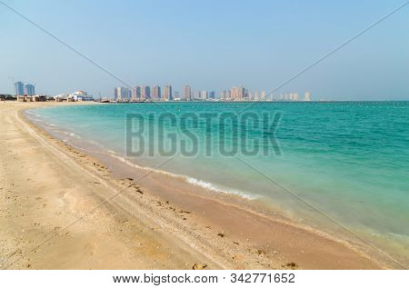 View of Katara Beach and West Bay skyline in Doha Bay area from Katara cultural village. Qatar, Middle East, Arabian Peninsula.