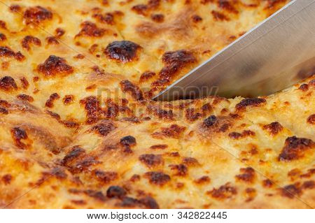 Mengrelian Khachapuri Texture Closeup With Knife Background Concept.