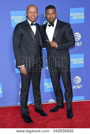 LOS ANGELES - JAN 02:  Bryan Steenson and Jamie Foxx arrives for the PSIFF Awards Gala 2020 on January 02, 2020 in Palm Sprimgs, CA                