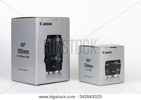 Two Boxes Of Lens Canon Ef 100 Mm F 2,8 And Canon Ef 50 Mm F 1,4