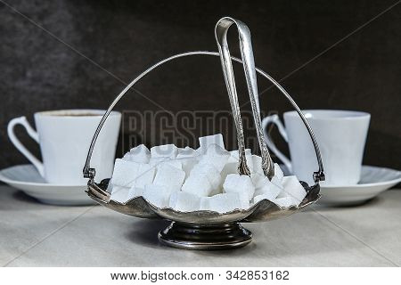 Sugar Cubes In Metal Vintage Sugar  Bowl With Sugar Tongs.