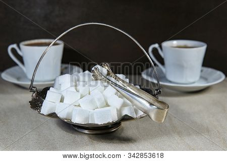 Sugar Cubes In Metal Vintage Sugar  Bowl With Sugar Tongs.