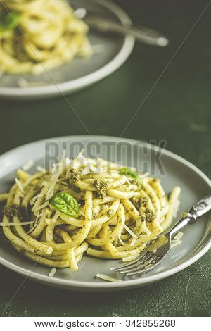 Spaghetti Pasta Bucatini With Pesto Sauce And Parmesan. Italian Traditional Perciatelli Pasta By Gen