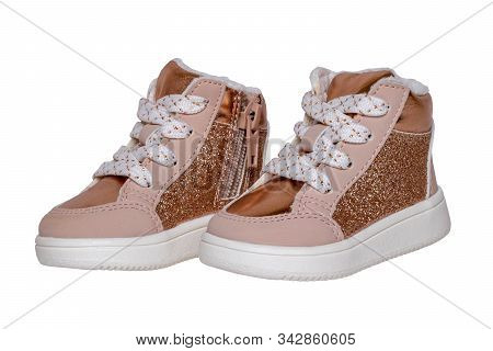 Ankle Boots. Close-up Of Child Girls Golden Suede Leather Shoes Isolated On A White Background. Macr
