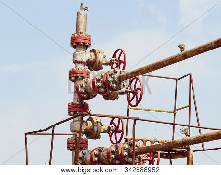 Well For Oil And Gas Production. Oil Well Wellhead Equipment. Oil Production.
