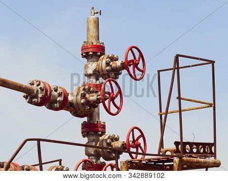 Well For Oil And Gas Production. Oil Well Wellhead Equipment. Oil Production.