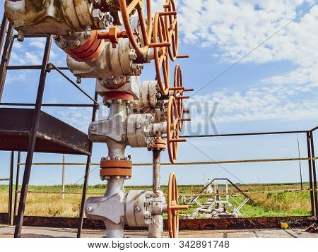 Wells In The Kuban. Extraction Of Hydrocarbons. Well For Oil And Gas Production. Oil Well Wellhead E