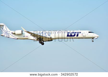 Warsaw, Poland. 24 July 2018. Airplane Es-ack Nordica Bombardier Crj-900lr  Taking Off From The Wars