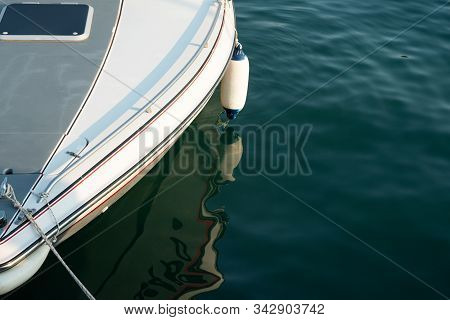 A Fragment Of The Bow Of A Motor Boat With A Mooring Shock Absorber Suspended From The Side. Copy Sp