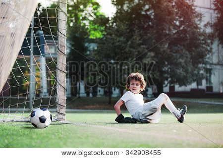 Childrens Soccer Football - A Match Of Young Children On The Football Field. Young Goalie. Kids - So