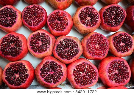 Pomegranate Grains Lined Up In Crates To Make Fruit Juice