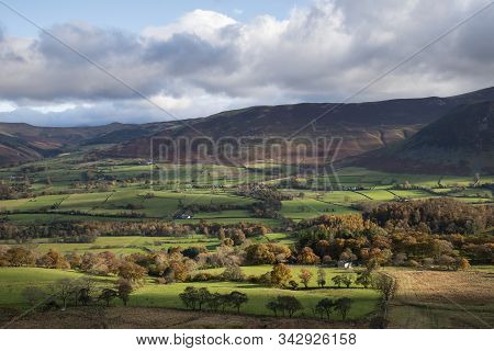 Stunning Autumn Fall Landscape View Along Valley Towards Mellbreak And Grasmoor In Lake District Wit
