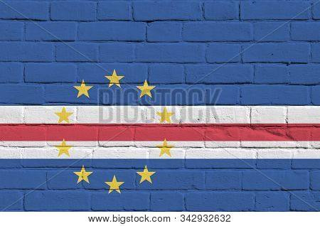 Cabo Verde Flag Depicted In Paint Colors On Old Brick Wall. Textured Banner On Big Brick Wall Masonr