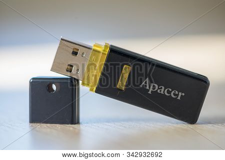 Timisoara, Romania - June 24, 2019: Close-up Of A Apacer Pen Drive, Flash Disk Sitting On A Disk Dri