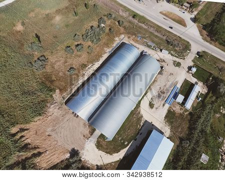Top View Of The Hangars. Hangar Of Galvanized Metal Sheets For The Storage Of Agricultural Products 
