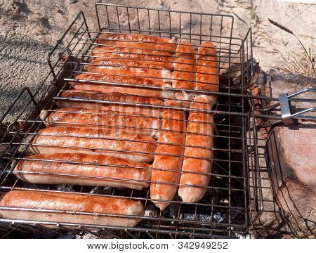 Kupaty Chicken Fried On A Fire. Barbecue From Kupaty.