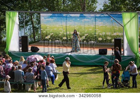 NIKOLSKIY / LENINGRAD REG, RUSSIA - JUN 16, 2018: During festival events dedicated to 69th anniversary of urban-type settlement Nikolskiy formation on the river Svir connecting Onega and Ladoga lakes.
