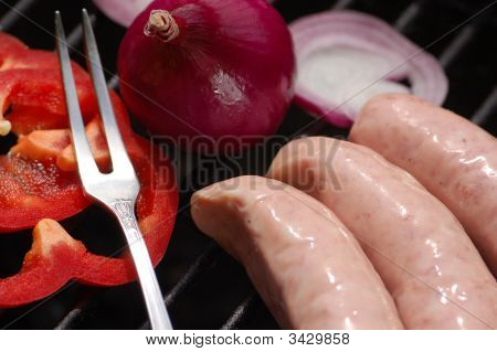 Saucisses blanches sur le gril