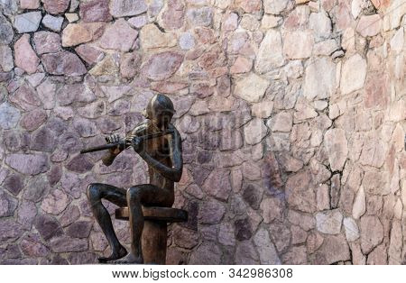 Puerto Vallarta, Jalisco, Mexica - December 23 2019: Small Neighborhood Sculpture On The Street Of P