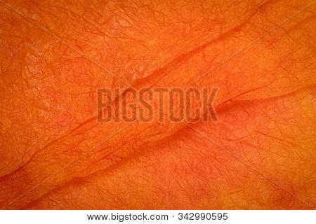 background of orange and red marbled momi paper