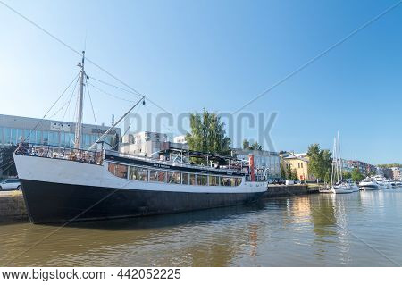 Turku, Finland - August 6, 2021: Wanha Rahtilaiva Restaurant Ship On Aurajoki River.