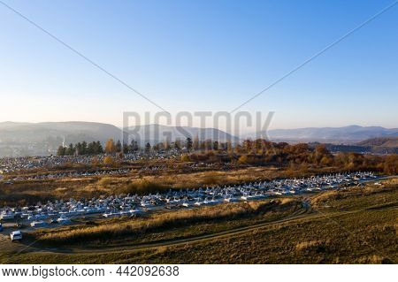 Aerial drone view of cemetery and graves in Dej city, Romania. Graveyard, view from above. 
