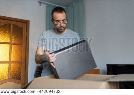 Adult Man Small Business Owner Packing Order Box Package Shipping To Customer. Entrepreneur Online S