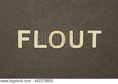 Gray Word Flout Made Of Wooden Letters On Brown Background