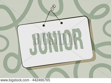 Hand Writing Sign Junior. Business Approach Erson Who Is A Specified Number Of Years Younger Than So
